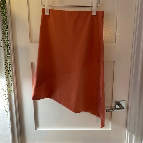 LAST CALL Wolford Asymmetric stretch skirt in mid coral - Picture 4 of 10
